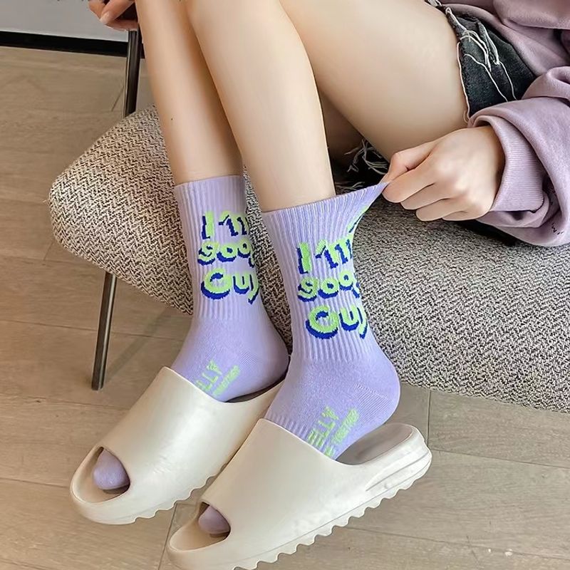 ถุงเท้าข้อยาว ถุงเท้าลายการ์ตูน แบบยืดหยุ่น ใส่สบายKorean green womens socks cartoon high waist socks sports socks