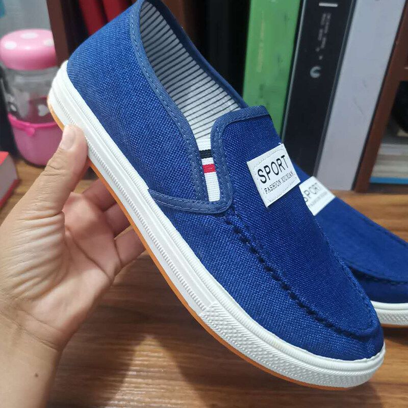 Mens Denim Canvas รองเท้าผ้าใบรองเท้าแวนแฟชั่นสำหรับผู้ชายสวมใส่สบายสีพื้นสไตล์เกาหลี Mens Shoes รองเท้าผ้าใบเฉพาะตัวเหยียบลื่นสวมใส่รองเท้าผ้าลินิน