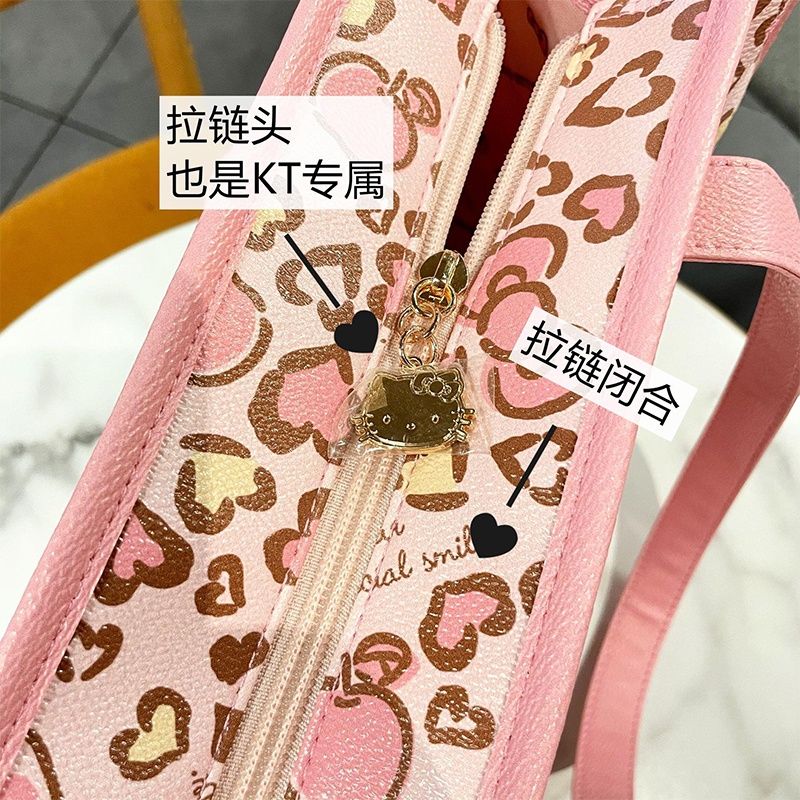 Sanrio Hello Kitty Kawaii Leopard Print KT Cat PU กระเป๋าถือ กระเป๋าสะพายไหล่ หูหิ้ว ขนาดใหญ่ จุของได้เยอะ สําหรับคุณแม่