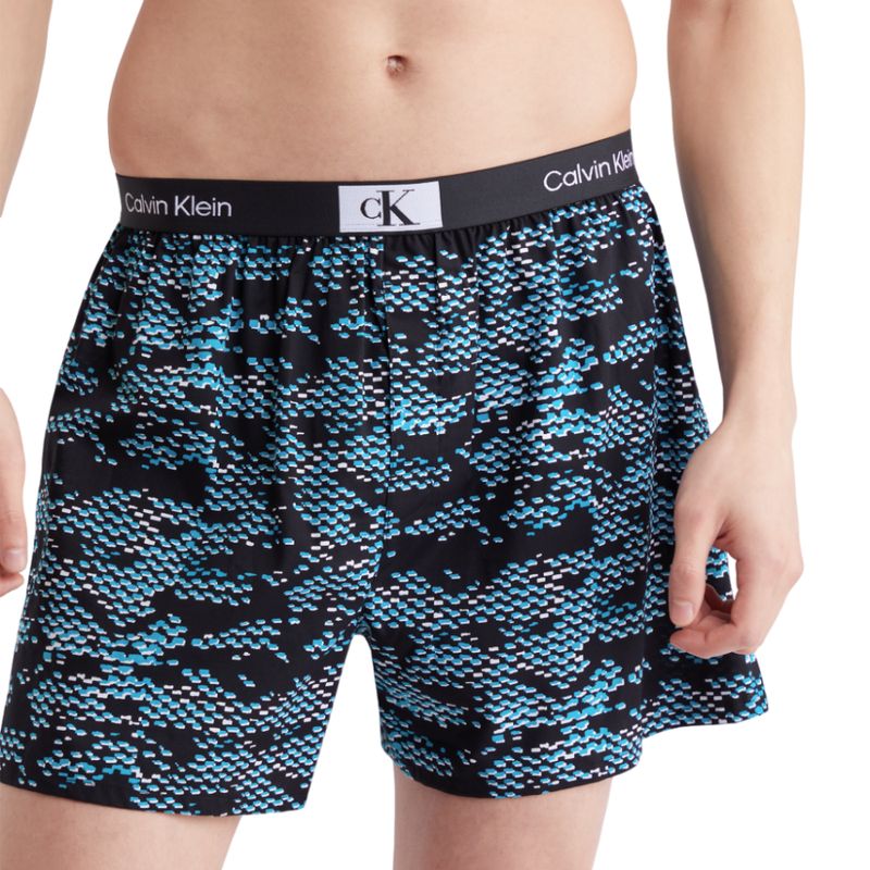 CALVIN KLEIN กางเกงบ๊อกเซอร์ผู้ชาย 1996 Wovens Cotton Boxer รุ่น NB3411 LO9 - สีดำ